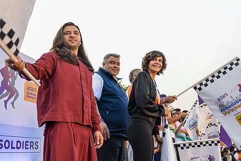 Actor Mandira Bedi, Olympic medallist Gagan Narang and Designer Aaquib Wani during the Adani Ahmedabad Marathon.