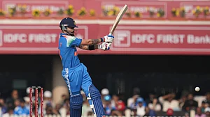 (AP Photo/Rafiq Maqbool) : India's Virat Kohli plays a shot during the first One Day International match between India and South Africa in Ranchi, India, Sunday, Nov. 30, 2025.