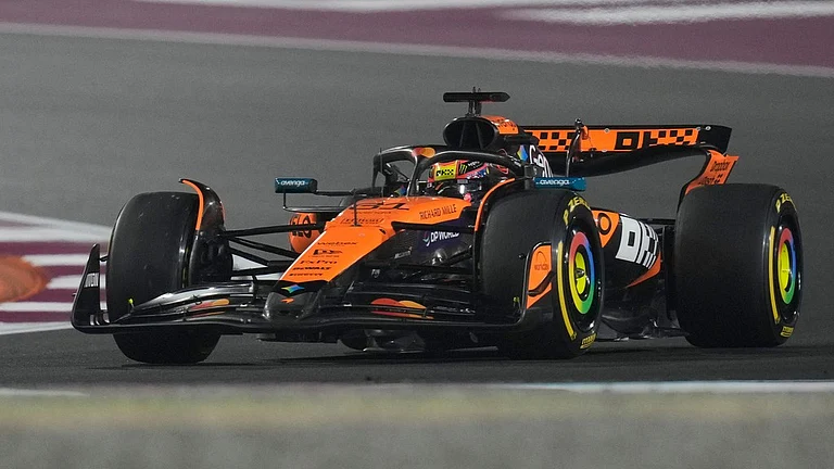 Qatar Grand Prix Live, F1 Main Race Updates: McLaren driver Oscar Piastri steers his car at the Lusail International Circuit. - Photo: AP