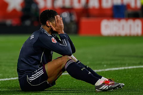 Real Madrid's Jude Bellingham reacts during a Spanish La Liga soccer match between Girona and Real Madrid, in Girona, Spain.
