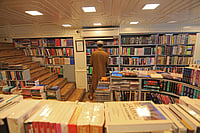 IMAGO : A man arranges books at his store in Srinagar, Kashmir, India, on August 12, 2025. The government of Jammu and Kashmir bans the sale, publication, and circulation of 25 books, alleging that the books propagate false narratives, glorify terrorism, and promote secessionism. The Jammu and Kashmir police conduct raids on several bookstores across the valley and confiscate the publications.