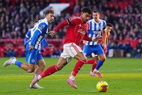 Nottingham Forest's Morgan Gibbs-White controls the ball, during the English Premier League soccer match between Nottingham Forest and Bright and Hove Albion,  at the City Ground, in Nottingham, England.