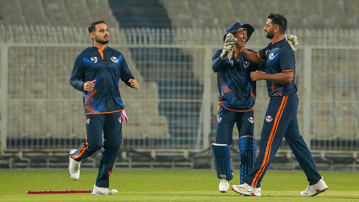 Jammu and Kashmir's Auqib Nabi, right, celebrates with teammates after taking the wicket of Bihar's Vaibhav Suryavanshi during a Syed Mushtaq Ali Trophy 2025 match in in Kolkata. - PTI