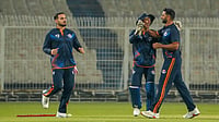 PTI : Jammu and Kashmir's Auqib Nabi, right, celebrates with teammates after taking the wicket of Bihar's Vaibhav Suryavanshi during a Syed Mushtaq Ali Trophy 2025 match in in Kolkata.