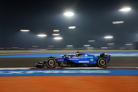 Williams driver Carlos Sainz of Spain steers his car during the Qatar Formula One Grand Prix, at the Lusail International Circuit, in Lusail, Qatar.