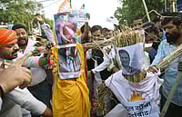 National Herald Case Continues To Haunt Gandhis Photo by Santosh Kumar/ Hindustan Times : PATNA, INDIA - APRIL 18: Members of Bharatiya Janata Yuva Morcha demonstrating with effigies of Congress leaders Sonia Gandhi and Rahul Gandhi in protest against involved in National Herald case, at Income Tax roundabout on April 18, 2025 in Patna, India.