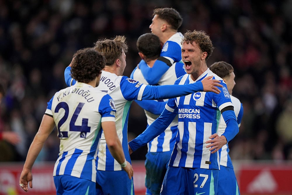 Brighton and Hove Albion's Mats Wieffer, right and teammates celebrate after Stefanos Tzimas scores his side's second goal of the game, during the English Premier League soccer match between Nottingham Forest and Bright and Hove Albion,  at the City Ground, in Nottingham, England. - | Photo: Joe Giddens/PA via AP