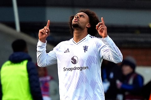 Manchester United's Joshua Zirkzee celebrates scoring during the English Premier League soccer match between Crystal Palace and Manchester United in London.