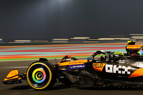 McLaren driver Lando Norris of Britain steers his car during the Qatar Formula One Grand Prix, at the Lusail International Circuit, in Lusail, Qatar.