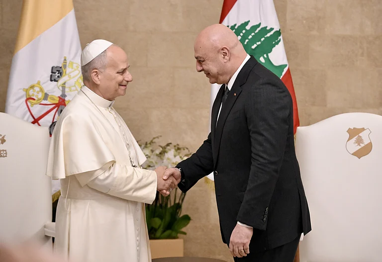 Pope Leo XIV is greeted by Lebanese President Joseph Aoun upon his arrival at the Presidential Palace in Beirut, Lebanon, Sunday, Nov. 30, 2025. - Alessandro Di Meo/Pool Via AP