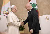 Alessandro Di Meo/Pool Via AP : Pope Leo XIV is greeted by Lebanese President Joseph Aoun upon his arrival at the Presidential Palace in Beirut, Lebanon, Sunday, Nov. 30, 2025.