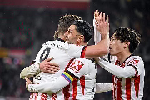 Vincenzo Grifo of SC Freiburg celebrates with his team after scoring a goal, during a German Bundesliga soccer match between SC Freiburg and 1. FSV Mainz 05, in Freiburg im Breisgau, Germany.