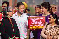 Photo: PTI/Ravi Choudhary : LoP in the Lok Sabha and Congress leader Rahul Gandhi, party's General Secretary Priyanka Gandhi Vadra and leader Sonia Gandhi during a protest against Special Intensive Revision (SIR) at Parliament complex during Winter session, in New Delhi.