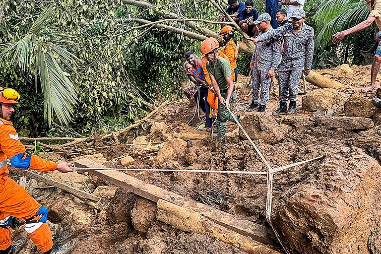 In this image, Rescue workers and National Disaster Response Force (NDRF) personnel during Operation Sagar Bandhu, India's rescue initiative in Sri Lanka following cyclone Ditwah, in Badulla, Sri Lanka. - Photo: @IndiainSL/X via PTI