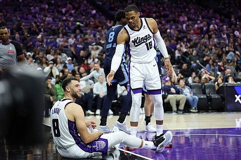 Sacramento Kings guard Zach Lavine (8) smiles towards the referees after a no-call during the second half of an NBA basketball game against the Memphis Grizzlies in Sacramento, Califonia. 