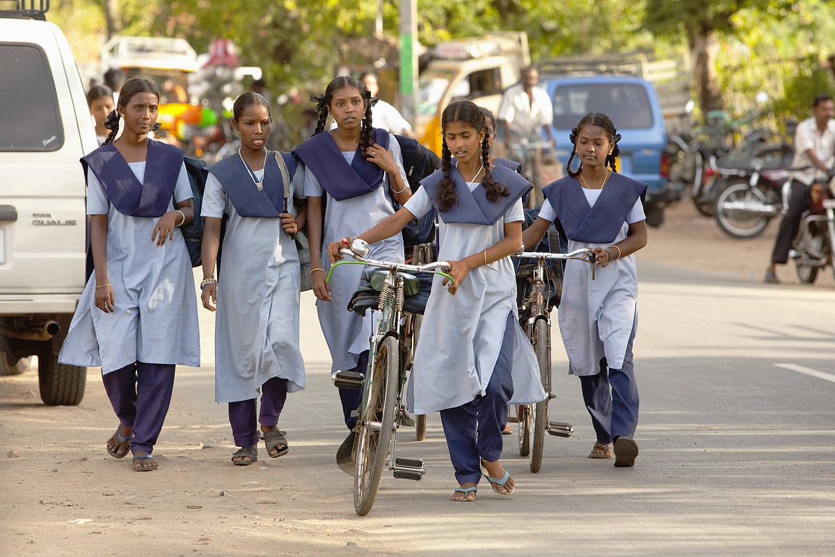 Girls In Uniform Walking Down The Street Together; Sathyamangalam, Tamil Nadu, India. - IMAGO / Design Pics Editorial