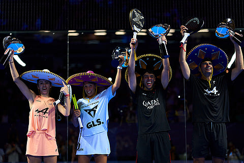 Claudia Fernandez Sanchez, Beatriz Gonzalez Fernandez, Agustin Tapia and Arturo Coello pose with their winner trophies during the trophy ceremony of the Premier Padel GNP Major Acapulco, Mexico on November 30, 2025.
