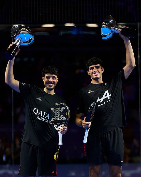 Agustin Tapia and Arturo Coellopose with their winner trophies during the trophy ceremony of the Premier Padel GNP Major Acapulco, Mexico on November 30, 2025.