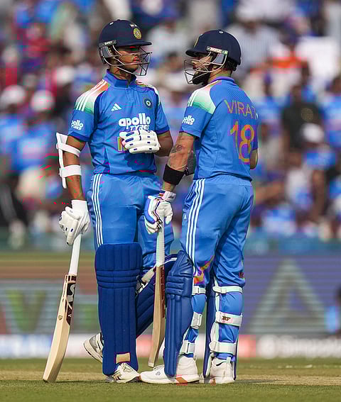 India's Yashasvi Jaiswal, left, and Virat Kohli greet each other between the wickets during the second ODI cricket match of a series between India and South Africa, at Shaheed Veer Narayan Singh International Stadium, in Raipur, Chhattisgarh.