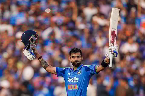 India's Virat Kohli celebrates his century during the second ODI cricket match of a series between India and South Africa, at Shaheed Veer Narayan Singh International Stadium, in Raipur, Chhattisgarh.