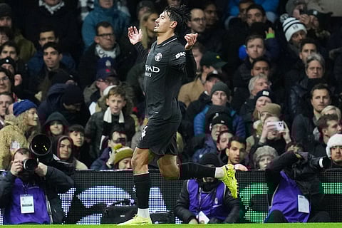 Manchester City's Tijjani Reijnders celebrates after scoring his sides second goal during the English Premier League soccer match between Fulham and Manchester City in London.