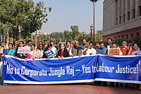 Day In Pics: December 03, 2025 | Photo: PTI/Ravi Choudhary : Congress leader Sonia Gandhi and Congress President Mallikarjun Kharge with others during a protest at the Parliament complex during the Winter Session, in New Delhi.