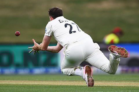New Zealand's Jacob Duffy completes a caught and bowled on the West Indies' Johann Layne during the second day of their cricket test match in Christchurch, New Zealand.
