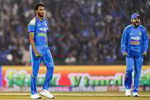 India's Prasidh Krishna, left, celebrates with Virat Kohli after taking the wicket of South Africa's captain Temba Bavuma during the second ODI cricket match of a series between India and South Africa, at Shaheed Veer Narayan Singh International Stadium, in Raipur, Chhattisgarh.