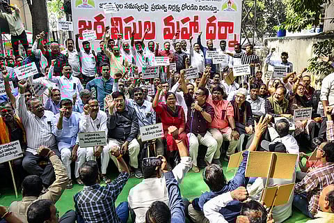 Members of Telangana Union of Working Journalists (TUWJ) and others stage a 'Maha Dharna' over alleged government’s indifference to their long-pending issues, at the I&PR office in Hyderabad.
