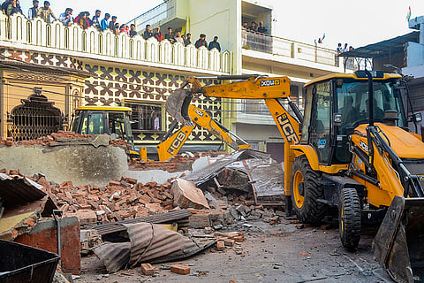 Excavators being used to demolish a building linked to an associate of arrested cleric Maulana Tauqeer Raza Khan, one of the accused in the Bareilly violence case, in Bareilly, Uttar Pradesh.