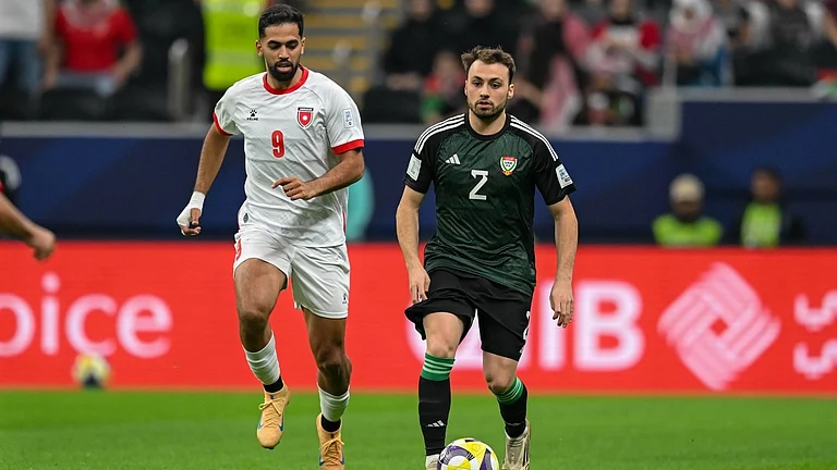 United Arab Emirates' Ruben Amaral is chased by Jordan's Ali Olwan during the FIFA Arab Cup 2025 match on December 3, 2025. - | Photo: Instagram/uaefa
