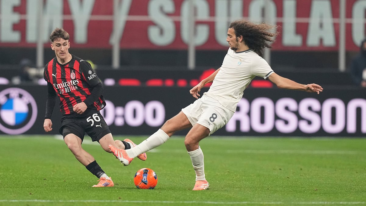 AC Milan's Alexis Saelemaekers and Lazio's Matteo Guendouzi challenge for the ball during their Serie A match on November 29, 2025. - | Photo: AP/Antonio Calanni
