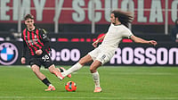 | Photo: AP/Antonio Calanni : AC Milan's Alexis Saelemaekers and Lazio's Matteo Guendouzi challenge for the ball during their Serie A match on November 29, 2025.