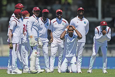West Indies' watch a third umpire review while playing New Zealand on day 3 during their cricket test match in Christchurch, New Zealand.