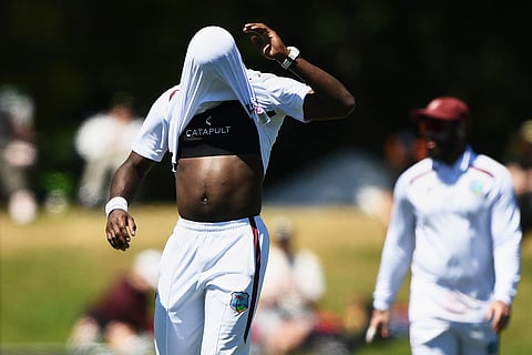 West Indies' Jayden Seales pulls his shirt over his head while playing New Zealand on day 3 during their cricket test match in Christchurch, New Zealand.