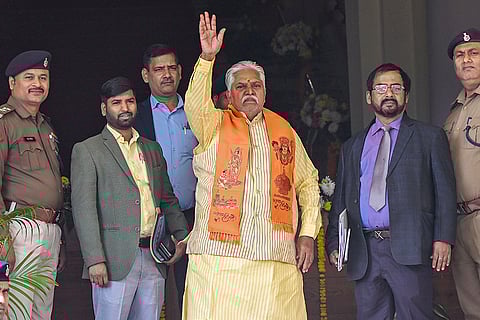 Bihar Assembly Speaker Prem Kumar gestures as he arrives to attend the Winter session of the State Assembly, in Patna.