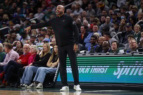 Detroit Pistons head coach J.B. Bickerstaff reacts during the first half of an NBA basketball game against the Milwaukee Bucks in Milwaukee. 