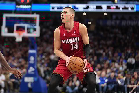 Miami Heat guard Tyler Herro prepares to shoot against the Dallas Mavericks during the second half of an NBA basketball game in Dallas. 