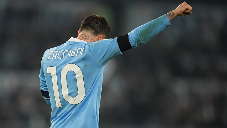 Lazio's Mattia Zaccagni reacts after scoring during the Coppa Italia round of 16 match against AC Milan on December 4, 2025. - | Photo: AP/Andrew Medichini