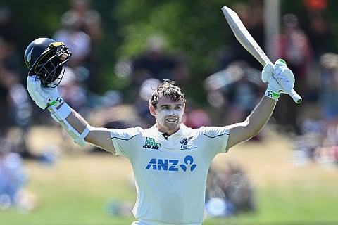 New Zealand's Tom Latham celebrates after making 100 runs against the West Indies on day 3 during their cricket test match in Christchurch, New Zealand.
