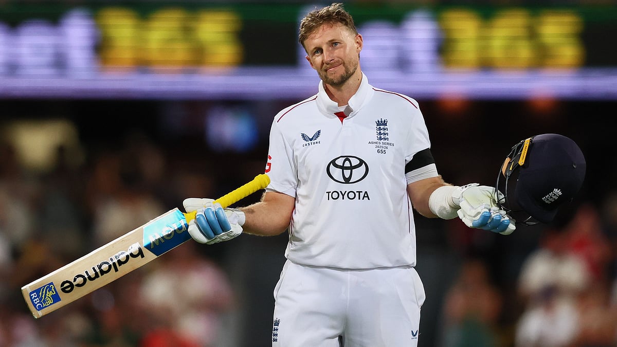 England's Joe Root celebrates his century during the second Ashes cricket test match between Australia and England in Brisbane, Thursday, Dec. 4, 2025. - AP Photo/Tertius Pickard