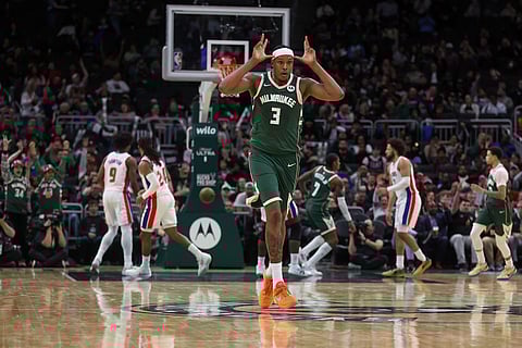 Milwaukee Bucks' Myles Turner celebrates after a shot during the second half of an NBA basketball game against the Detroit Pistons in Milwaukee. 