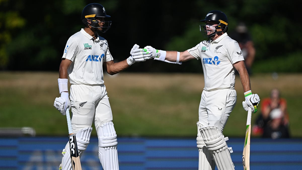 New Zealand's batters Rachin Ravindra and Tom Latham encourage each other while batting against the West Indies on day 3 during their cricket test match in Christchurch, New Zealand, Thursday, Dec. 4, 2025.  - | Photo: AP/Andrew Cornaga                                          