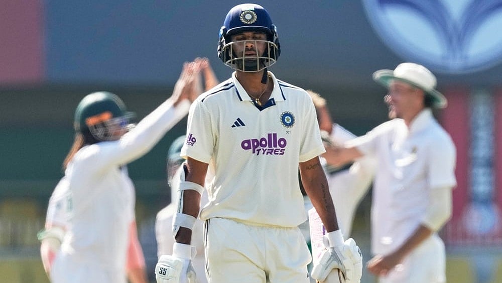 India's Washington Sundar walks off the field after losing his wicket on the fifth day of the second cricket test match between India and South Africa in Guwahati. - | Photo: AP/Anupam Nath