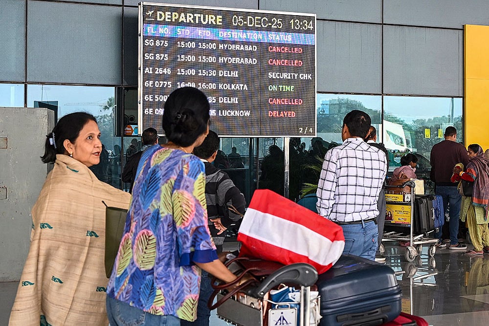 | Photo: PTI  : Stranded passengers at Jay Prakash Narayan International Airport following IndiGo flight cancellations, in Patna.