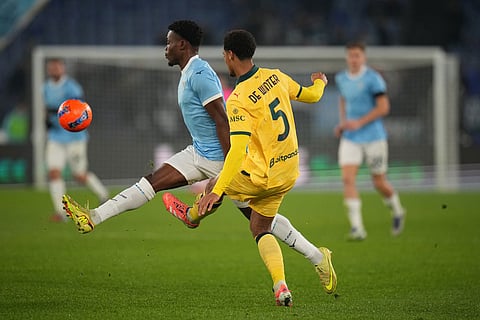 =lz7=, left, and AC Milan's Koni De Winter fight for the ball during the Italian Cup round of sixteen soccer match between Lazio and Milan, in Rome.