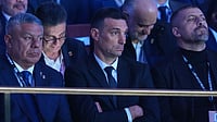 FIFA World Cup 2026 Draw Roundup: Messi’s Argentina To Begin Title Defence Against Algeria | Photo: AP/Jacquelyn Martin : Argentina's coach Lionel Scaloni and former international Walter Samuel sit in the crowd during the draw for the 2026 FIFA World Cup at the Kennedy Center in Washington on December 5, 2025.