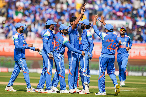 India's Arshdeep Singh with teammates celebrates the wicket of South Africa's Ryan Rickelton during the third ODI cricket match of a series between India and South Africa, at ACA-VDCA Cricket Stadium, in Visakhapatnam, Andhra Pradesh.