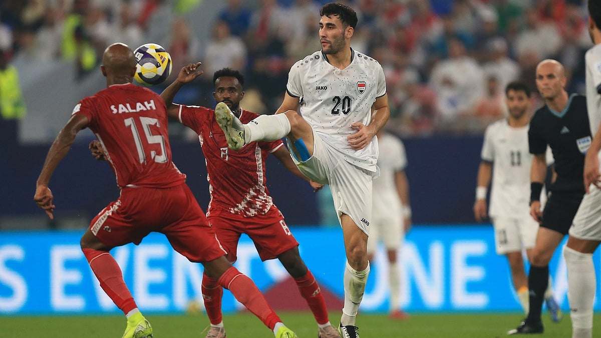 Iraq's Zaid Ismail and Sudan's Salaheldin Adil challenge for the ball during their FIFA Arab Cup match on December 6, 2025. - | Photo: X/IraqNT_EN