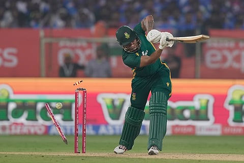 South Africa’s Ottneil Baartman is bowled out by India's Prasidh Krishna during the third One Day International cricket match between India and South Africa in Visakhapatnam.